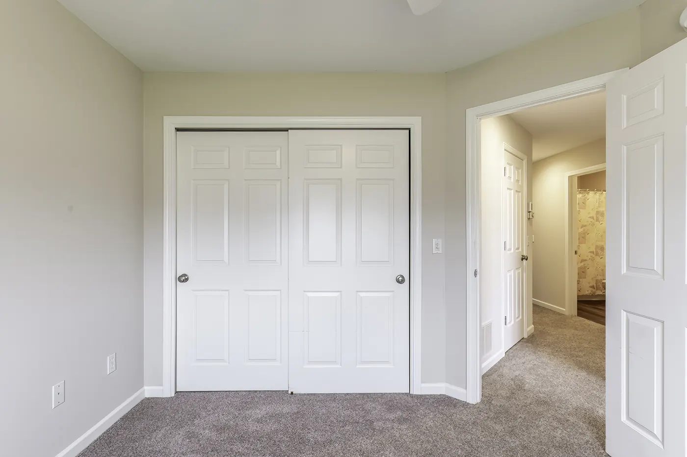Bedroom at 1906 Kelleys Landing, Fort Wayne IN featuring large sliding-door closet