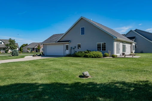 Exterior · Garage and side elevation at 1906 Kelleys Landing