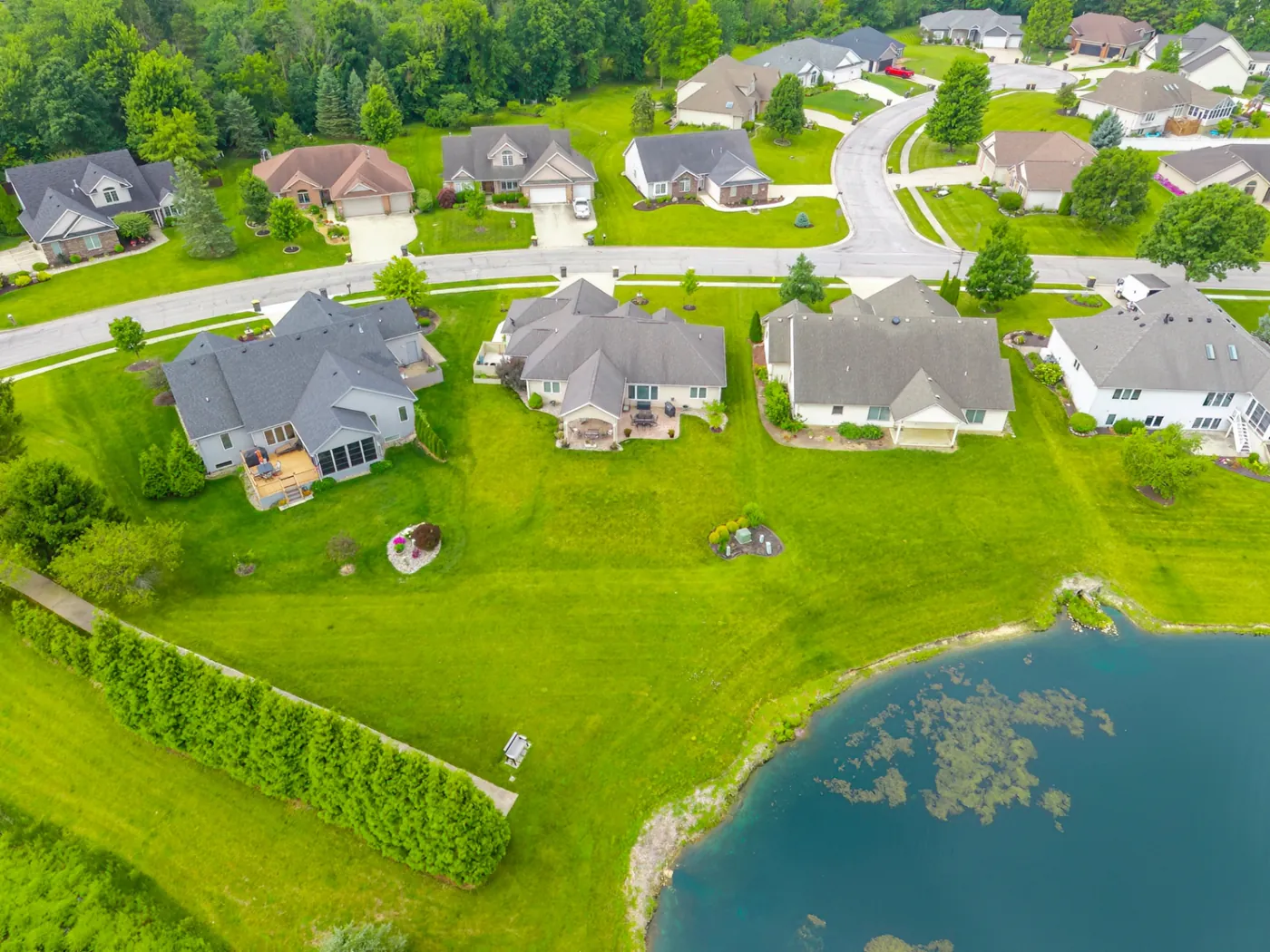 Aerial of waterside homes along the pond near 1906 Kelleys Landing, Fort Wayne IN