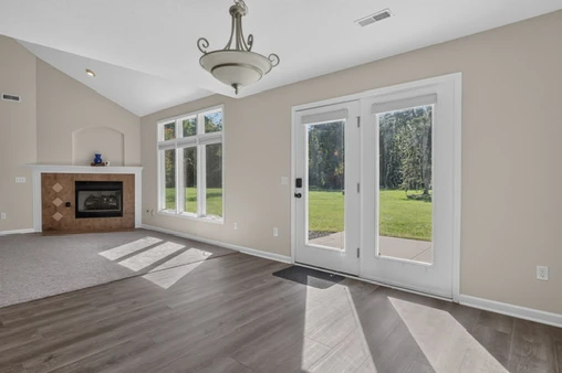 Main Level · Dining area and fireplace at 1906 Kelleys Landing