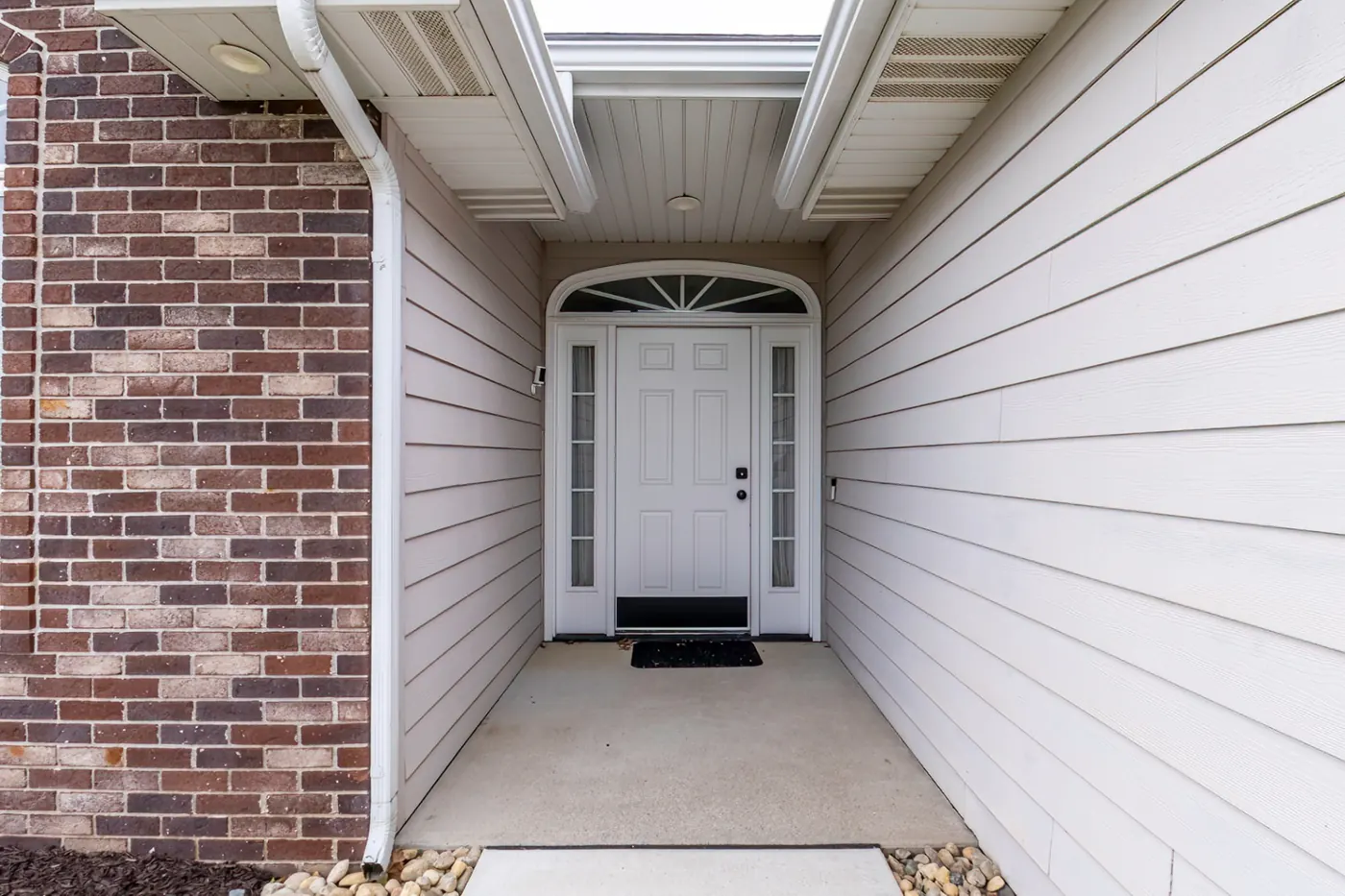 Covered front entry and white door at 1906 Kelleys Landing, Fort Wayne IN, Fort Wayne IN
