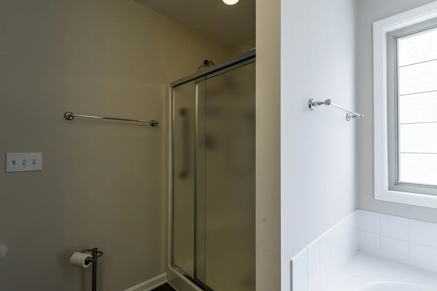 Glass-enclosed walk-in shower in the primary bath at 1906 Kelleys Landing, Fort Wayne IN