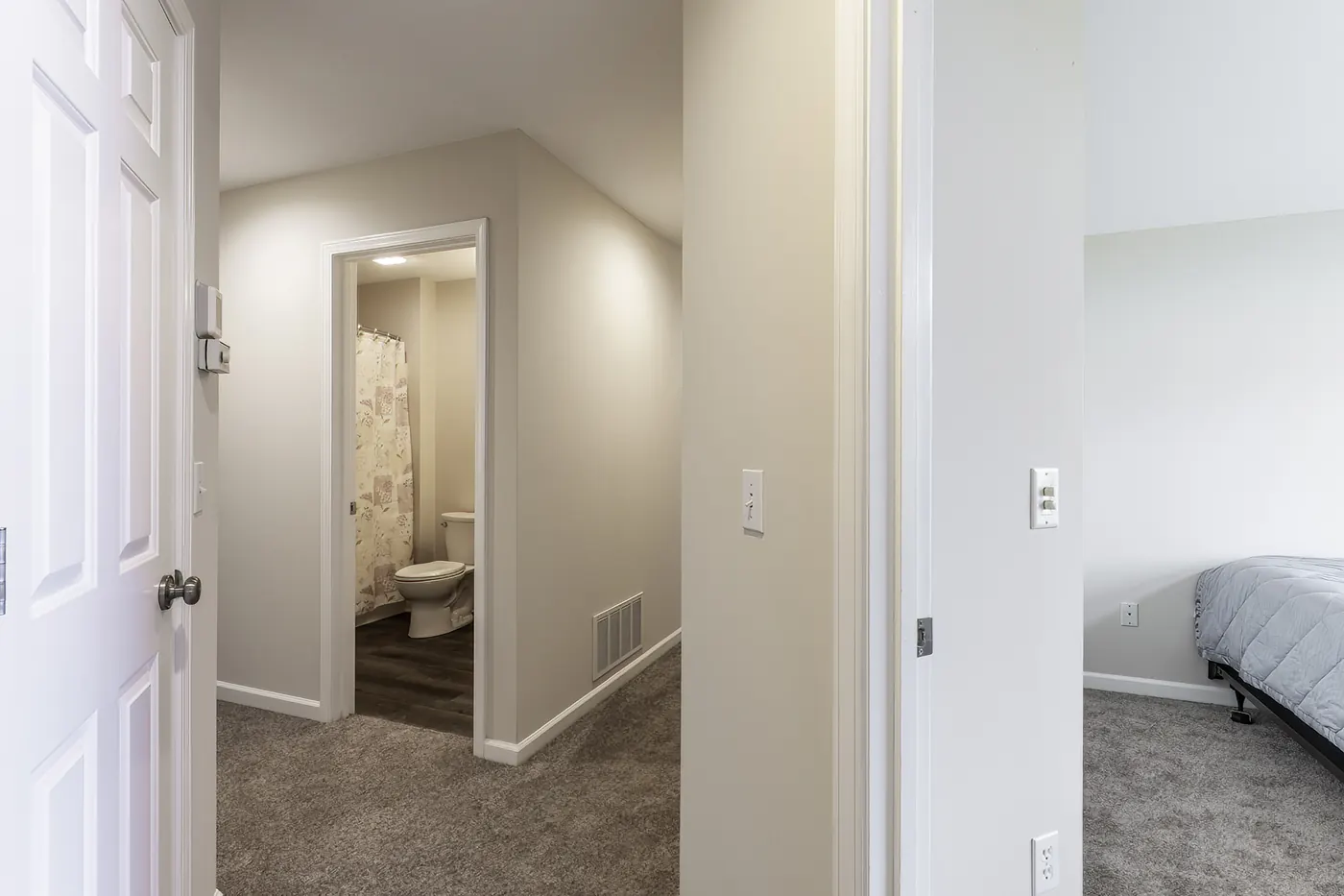 Interior hallway at 1906 Kelleys Landing, Fort Wayne IN leading to bathroom and bedrooms