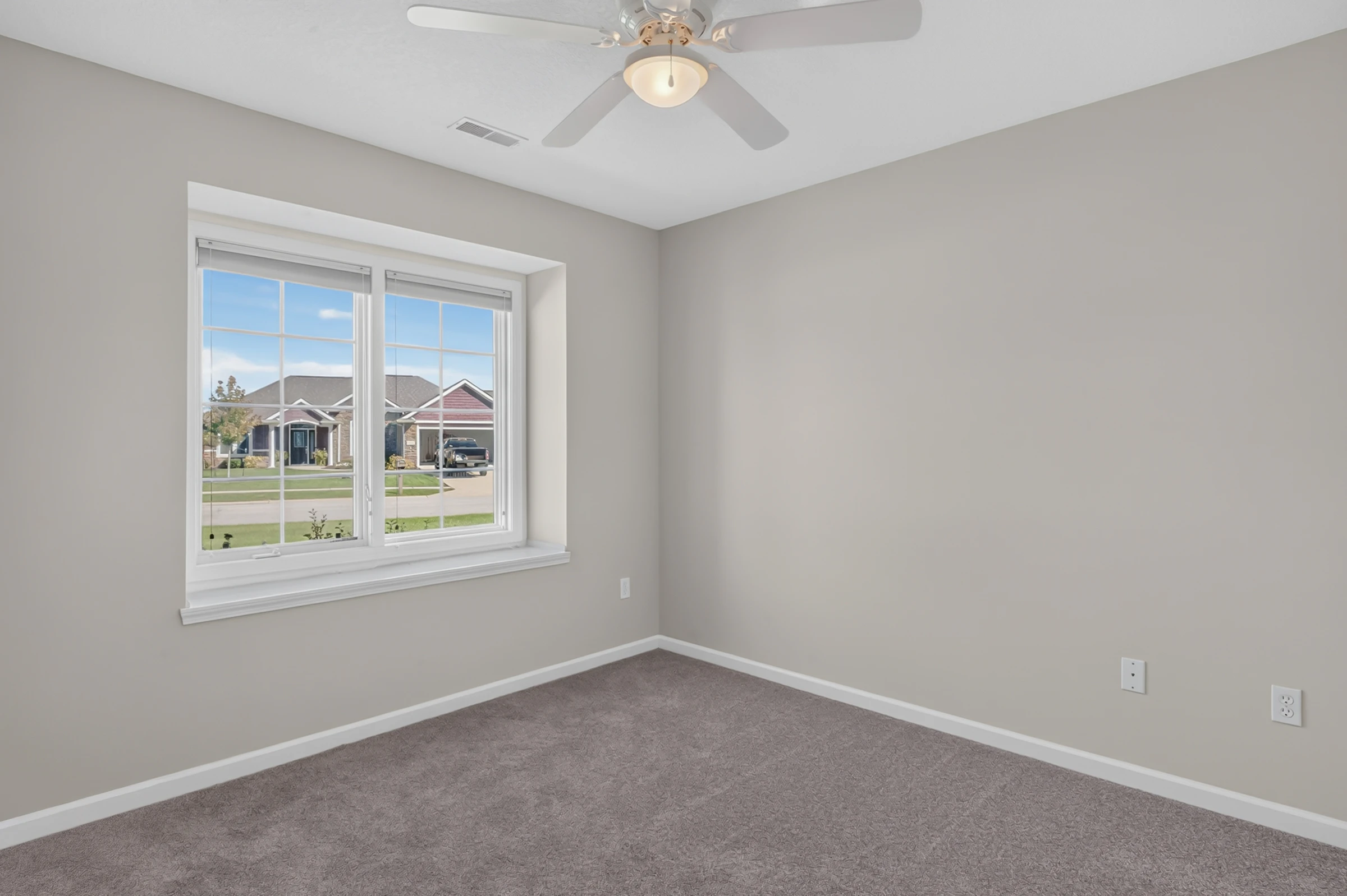 Main Level · Bedroom with large window at 1906 Kelleys Landing