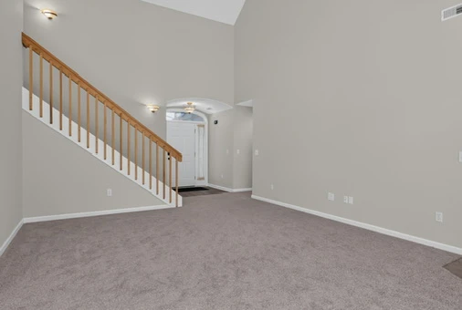 Main Level · Great room and loft staircase at 1906 Kelleys Landing