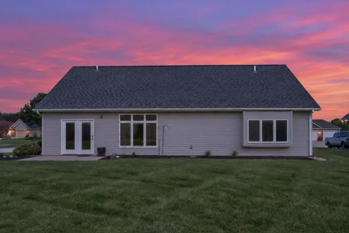 Exterior · Rear elevation at dusk at 1906 Kelleys Landing
