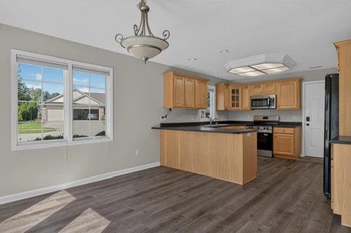 Main Level · Kitchen and center island at 1906 Kelleys Landing
